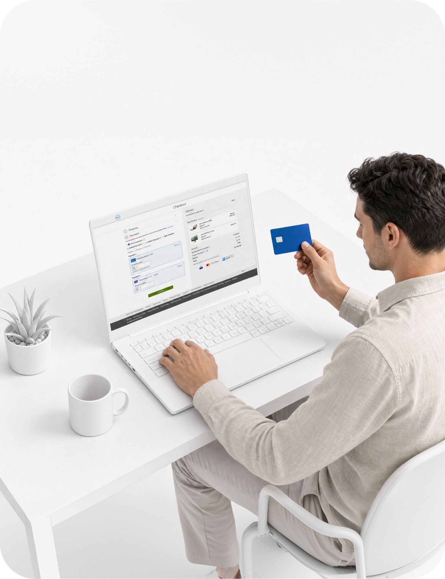 Person at a laptop on a Dell split-payment checkout screen holding a blue card